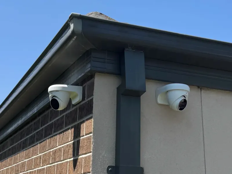 Two CCTV cameras mounted under the eaves of a Mount Eliza home