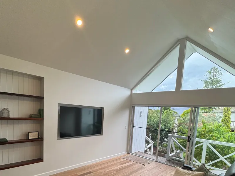 Sensor and downlight installation in a Seaford living room
