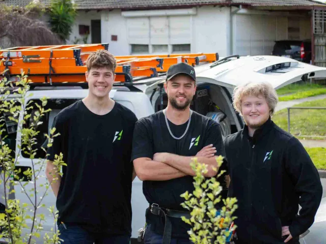 Nick, Will and Josh from Streamline Electrical standing in front of their work van